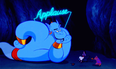 Genie from Aladdin with the Applause sign above his head