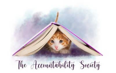 cat under book