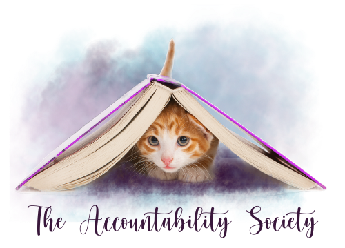 cat under book